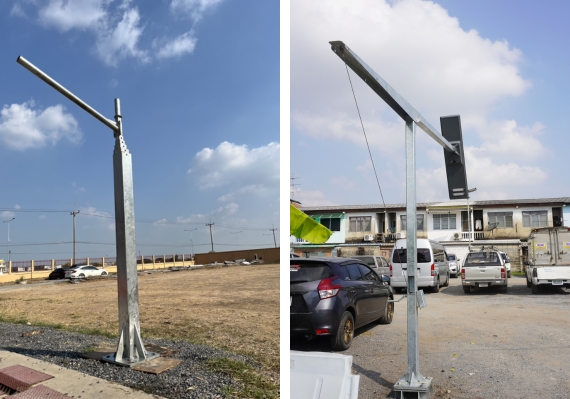 เสาพับได้ เป็นเสาไฟถนนที่ออกแบบพิเศษให้สามารถพับหรือโน้มลงมาได้ทางบริเวณข้อต่อใกล้ฐานของเสา จุดประสงค์เพื่อให้สามารถลดระดับกิ่งโคมและโคมไฟลงมาถึงระดับพื้นดินสำหรับการบำรุงรักษาหรือซ่อมแซม โดยไม่จำเป็นต้องปีนเสาหรือใช้รถกระเช้า เสาลักษณะนี้มักพบในการติดตั้งไฟถนนในพื้นที่ที่การเข้าถึงยาก หรือในบริเวณที่ต้องการความสะดวกและปลอดภัยในการซ่อมบำรุง เช่น เสาไฟส่องทางในตรอกซอยแคบ หรือเสาไฟสวนสาธารณะที่เจ้าหน้าที่สามารถปรับลดระดับลงมาทำงานได้ง่าย เสาพับได้ชนิดกิ่งเดี่ยวที่นิยมใช้ทั่วไปผลิตจากเหล็กเคลือบสังกะสี (ชุบกัลวาไนซ์) ทั้งต้นเพื่อป้องกันสนิมตลอดอายุการใช้งาน มีความสูงให้เลือกตั้งแต่ประมาณ 4–9 เมตรตามความต้องการในการส่องสว่างของพื้นที่ โดยจุดหมุนบริเวณคอเสาจะมีสลักยึดทำจากสเตนเลสเพื่อความแข็งแรงและไม่เป็นสนิม ส่วนรุ่นที่มีความสูงมาก (เช่น 6 เมตรขึ้นไป) มักติดตั้งชุดรอกและลวดสลิงพร้อมกลไกนิรภัย เพื่อให้การผ่อนเสาลงและดึงเสาขึ้นล็อกทำได้อย่างปลอดภัย ไม่พลิกหรือตกลงมาโดยฉับพลัน ภายในเสามีช่องสำหรับติดตั้งอุปกรณ์ควบคุมไฟฟ้าและมีช่องเซอร์วิสใกล้โคนเสาเพื่อความสะดวกในการดูแลอุปกรณ์ไฟฟ้าต่าง ๆ วัสดุและมาตรฐาน: เสาพับได้คุณภาพสูงจะใช้เหล็กรีดร้อนกำลังสูง ชุบกัลวาไนซ์มาตรฐาน ASTM เช่นเดียวกับเสาไฟถนนทั่วไป เพื่อให้มั่นใจว่าโครงสร้างเสามีความแข็งแรงและทนทานต่อสภาพอากาศภายนอก ผู้ใช้งานสามารถมั่นใจได้ว่าเสาพับได้ที่ผลิตในประเทศไทยสามารถรองรับโคมไฟถนน LED หรืออุปกรณ์เสริมต่าง ๆ ได้อย่างมั่นคงและมีอายุใช้งานยืนยาว เสาพับได้ถือเป็นอีกหนึ่งนวัตกรรมการออกแบบของผู้ผลิตไทยที่ช่วยลดความเสี่ยงในการทำงานบนที่สูงและประหยัดเวลาในการบำรุงรักษาระบบไฟฟ้า